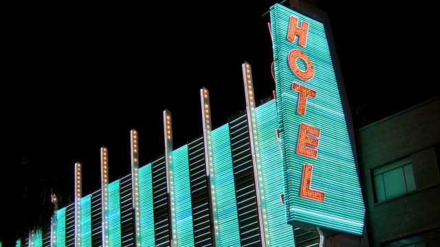 Vertical Neon Hotel Sign