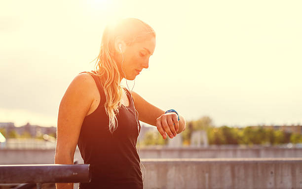istock Exercising woman outdoors 472879852