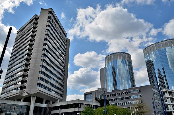 istock Offenbach: Brutalist Town Hall and Glass Towers. 472885652