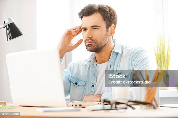 Concentrated On Work Stock Photo - Download Image Now - 20-29 Years, 2015, Adult