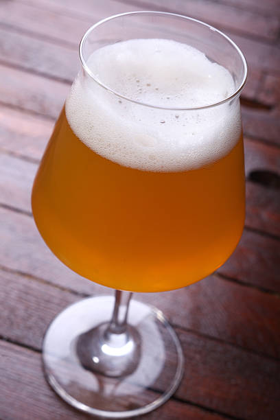 istock Wheat beer on wood 472889138