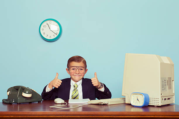 young boy の実業家のオフィスで親指を立てる - thumbs up child success winning ストックフォトと画像