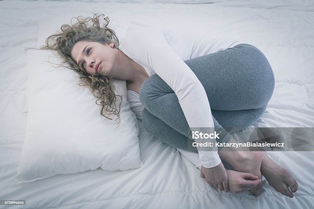 Woman with mental disease Young pretty lonely woman suffering from mental disease 2015 Stock Photo