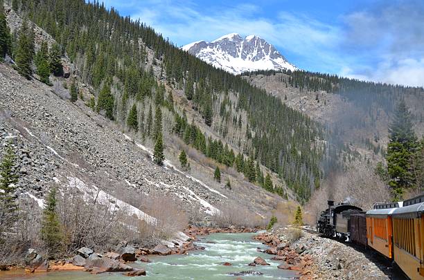 istock Steam Train in the Mountains 472898532