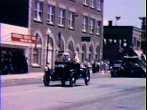 Model A car in parade--From 1950's film