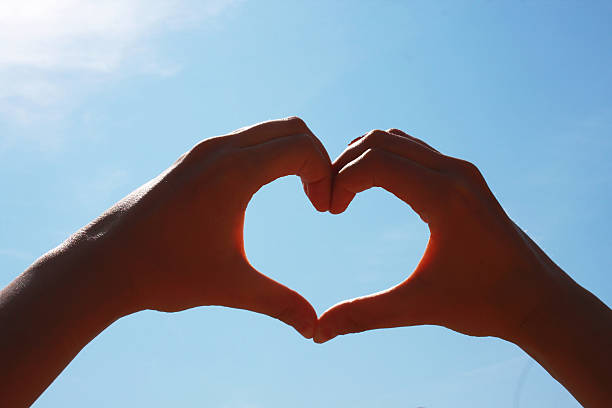 istock Heart of two hands 472903720