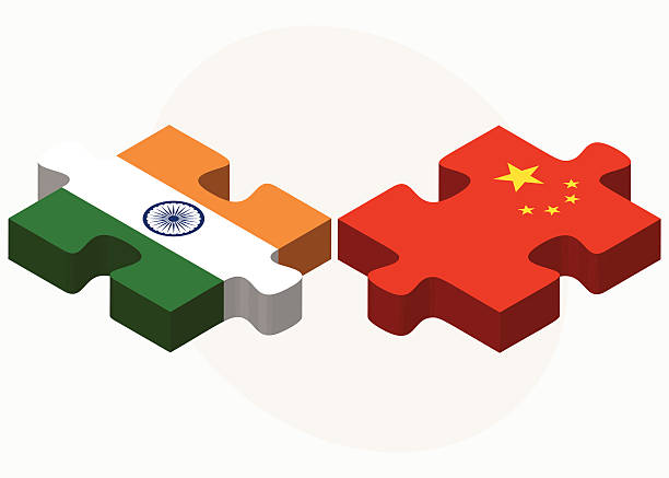 India and China Flags in puzzle Vector Image - India and China Flags in puzzle isolated on white background indian music stock illustrations