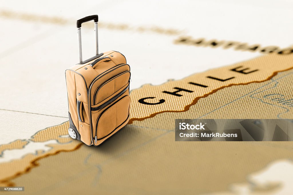 Destination Chile. Orange suitcase on the map. 2015 Stock Photo