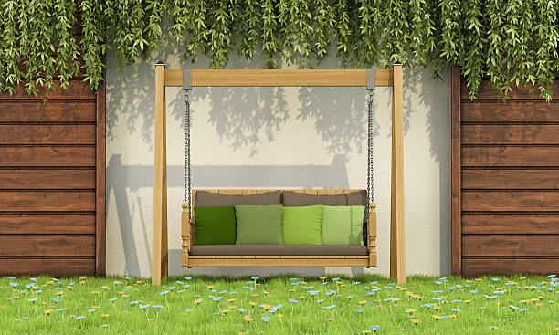 istock wooden swing in a garden 472910116