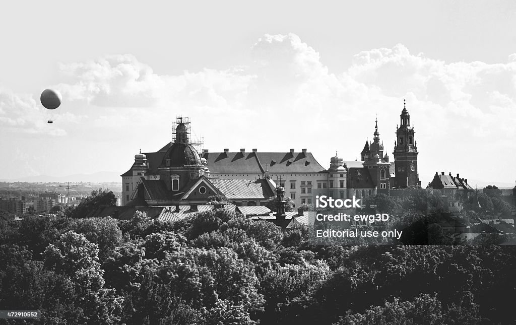 Cracow in Poland Cracow, Poland - July 03, 2013: Beautiful aerial view of a historic architectural ensemble on the hill with Wawel Royal Castle and Cathedral Basilica in Cracow, Poland. Wawel Royal Castle inscribed on the UNESCO World Heritage List.  19th Century Style Stock Photo