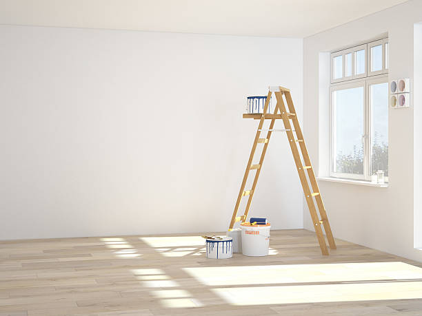 istock Painting walls in room with ladder during renovation. 3d rendering 472915980