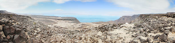 istock Crater dry lake Assal. Shore covered with salt. 472916322