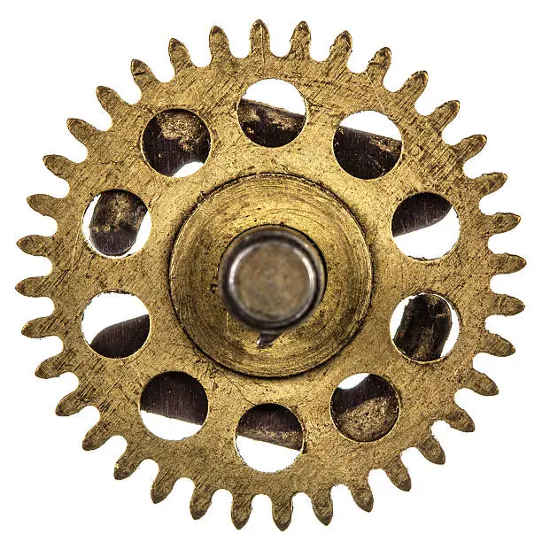 Photo of Pinion of old clock mechanism, isolated on white background