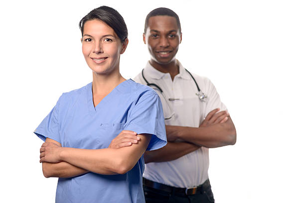 istock Successful female doctor in scrubs 472917302
