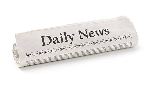 istock Rolled newspaper with the headline Daily News 472921074
