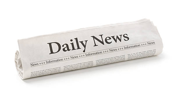 Rolled newspaper with the headline Daily News Rolled newspaper with the headline Daily News rolled up magazine stock pictures, royalty-free photos & images