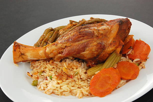 istock Greek Slow Cooked Lamb Shank With Rice and Vegetables 472923758