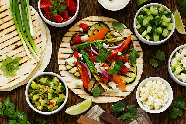 istock Vegetarian snack tacos with grilled vegetables and salsa. 472924206