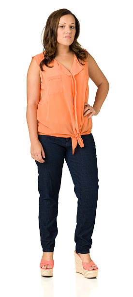 istock Serious Young Woman, Full-Length Portrait 472933010
