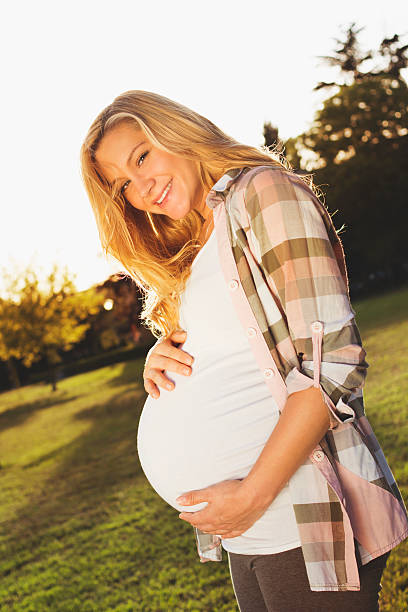 istock Pregnant young woman 472937148