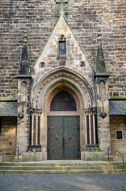 Old medieval church doorway, with ornate ironwork, Hannover, Germany