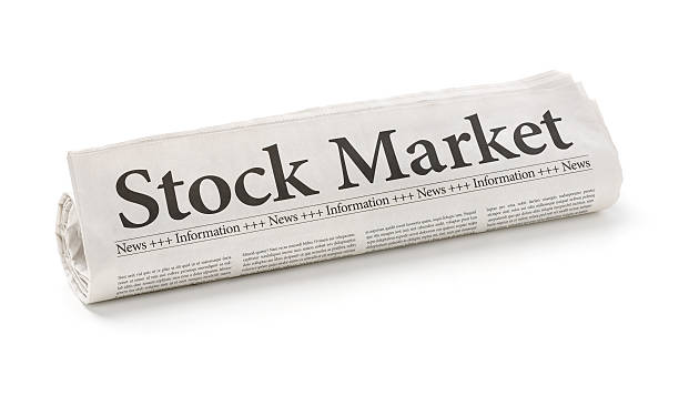 istock Rolled newspaper with the headline Stock Market 472944874