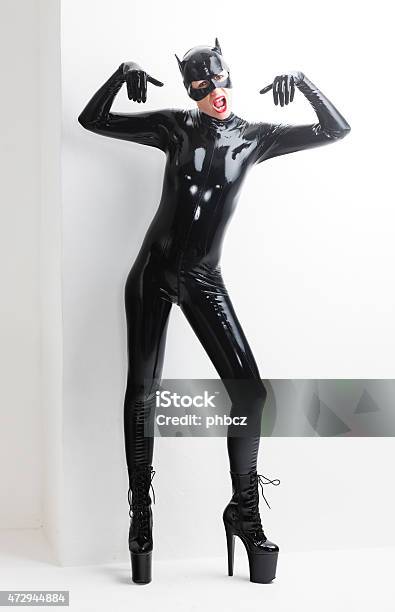 Standing Woman Stock Photo - Download Image Now - Latex, Black Color, Females