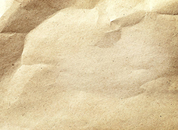 istock Old crumpled, recycled brown paper texture 472946396