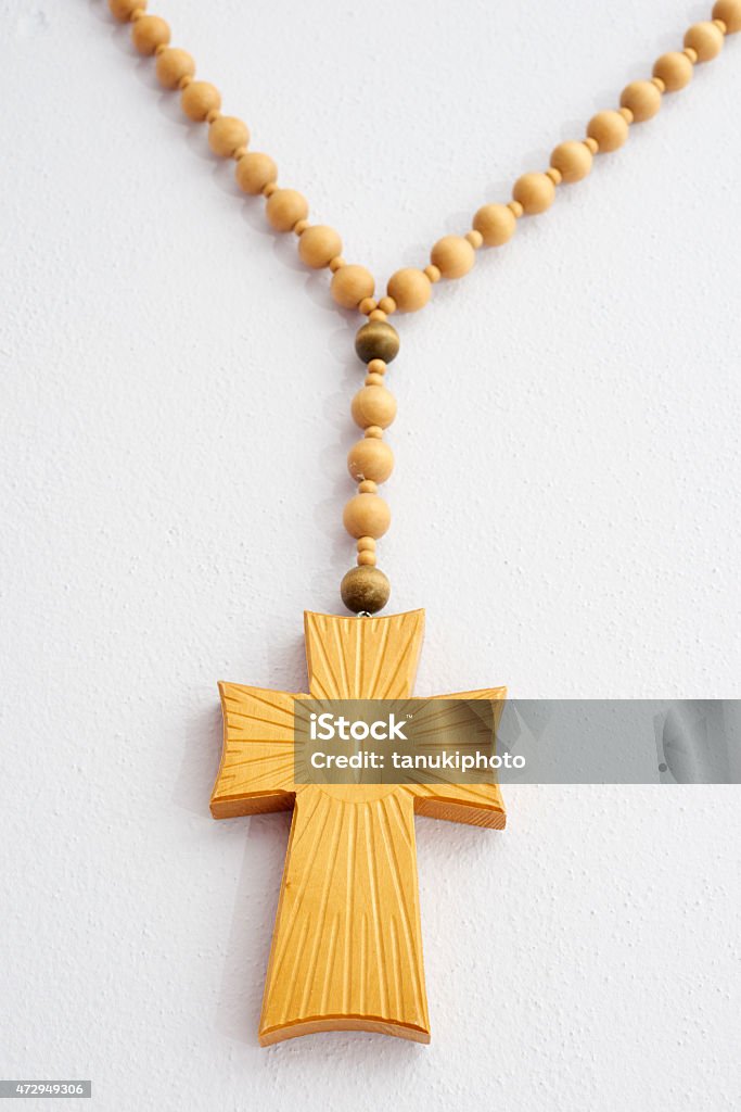 Crucifix A wooden, Christian Crucifix on a wall. 2015 Stock Photo