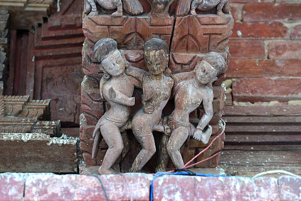 Erotic carvings on a Hindu temple in Kathmandu, Nepal Kathmandu, Nepal - September 29, 2013: Erotic carvings on a Hindu temple, now destroyed after the massive earthquake that hit Nepal on April 25, 2015 lingam yoni stock pictures, royalty-free photos & images