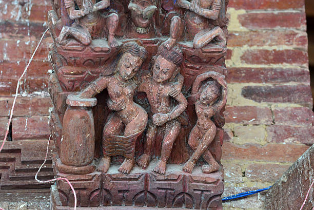 Erotic carvings on a Hindu temple in Kathmandu, Nepal Kathmandu, Nepal - September 29, 2013: Erotic carvings on a Hindu temple, now destroyed after the massive earthquake that hit Nepal on April 25, 2015 lingam yoni stock pictures, royalty-free photos & images