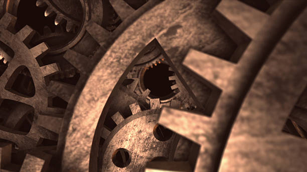 istock Big metal gears on glossy black background 472953914