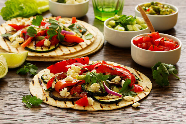 istock Vegetarian snack tacos with grilled vegetables and salsa. 472957994