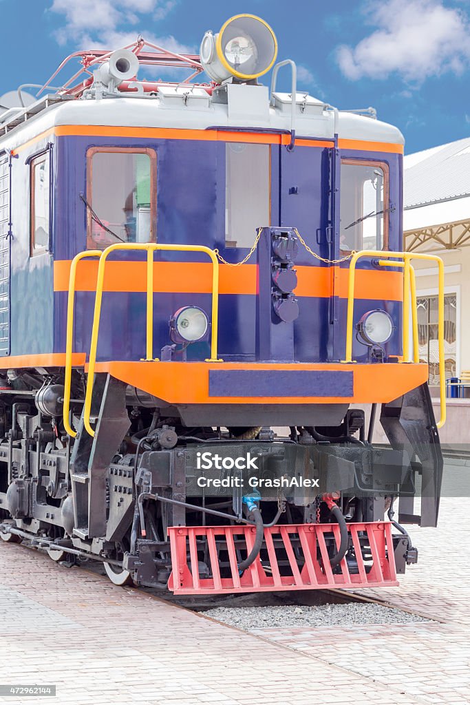 Vintage train front view Purple vintage diesel train with yellow railing in front 2015 Stock Photo