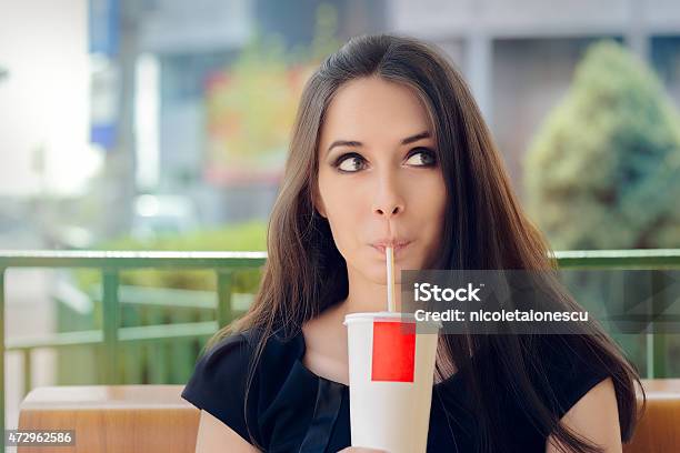 Young Woman Having A Summer Refreshing Drink Outside Stock Photo - Download Image Now