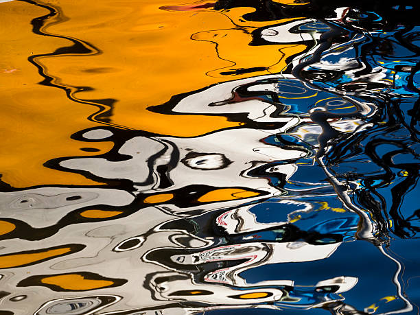 istock reflection of boat in water,Lake Wndermere,Cumbria,Brit 472963004