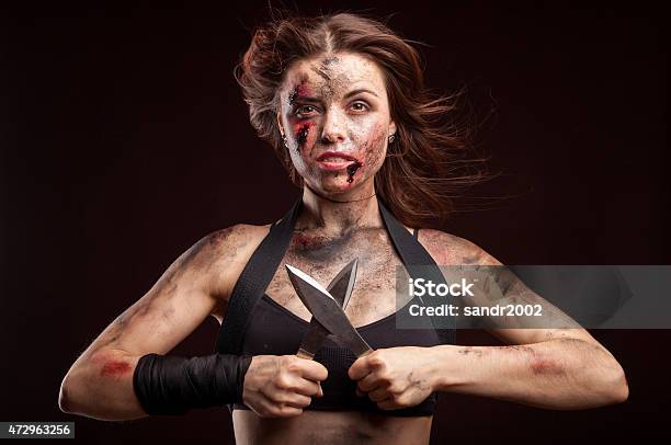 Killer Woman With Knife Posing In Studio Stock Photo - Download Image Now - Assassination, One Woman Only, Women