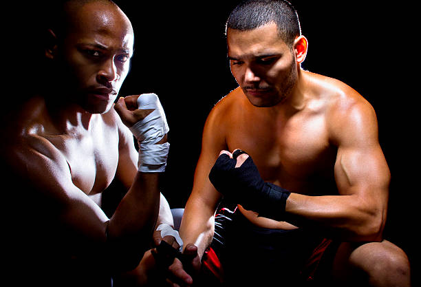 istock Trainer Motivating a Boxer or MMA Fighter 472966852