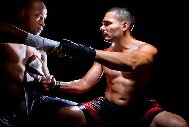 istock Trainer Motivating a Boxer or MMA Fighter 472966860