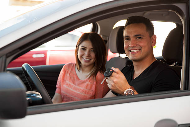 istock Young couple with a new car 472969642