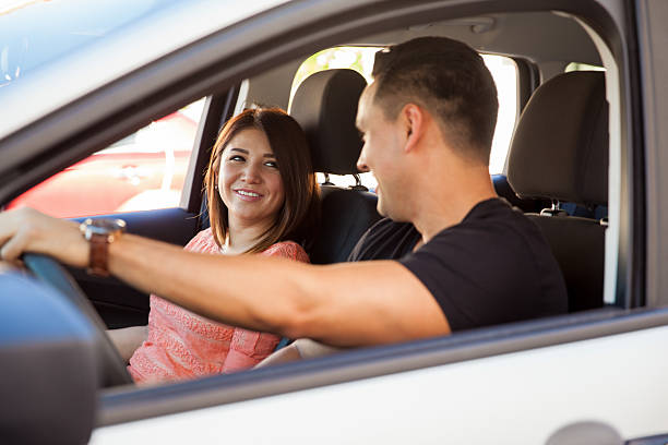 istock Young couple traveling by car 472969654