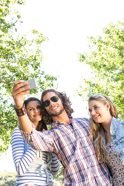 istock Happy friends taking a selfie 472970556