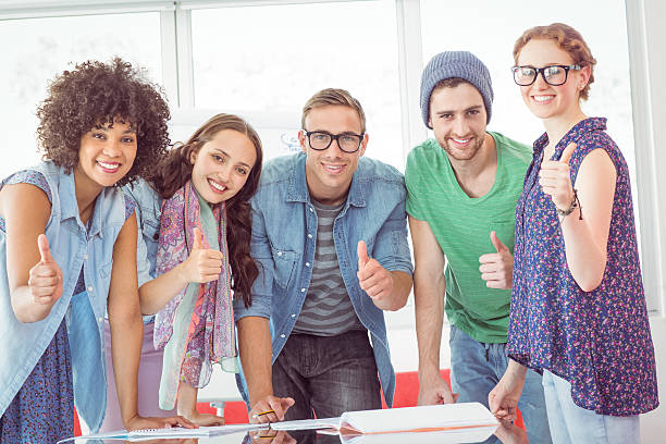 istock Fashion students working as a team 472971218