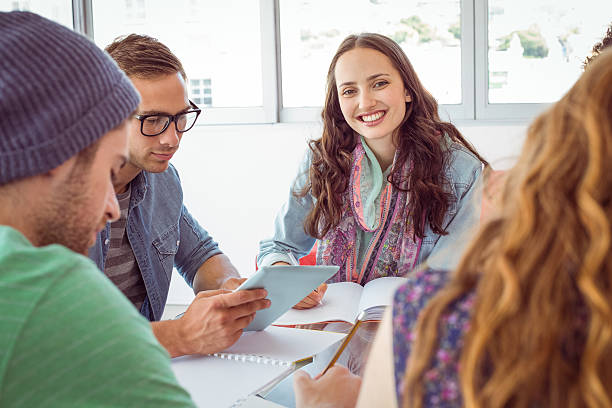 istock Fashion students working as a team 472973406