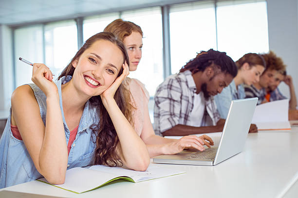 istock Fashion student smiling at camera 472974266