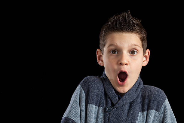 istock Boy With Spikey Hair Surprised 472974528