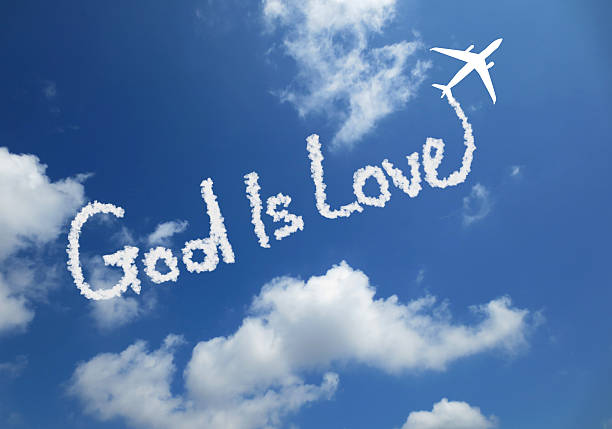 God is love God is love! text in clouds form with blue sky background words in the sky stock pictures, royalty-free photos & images