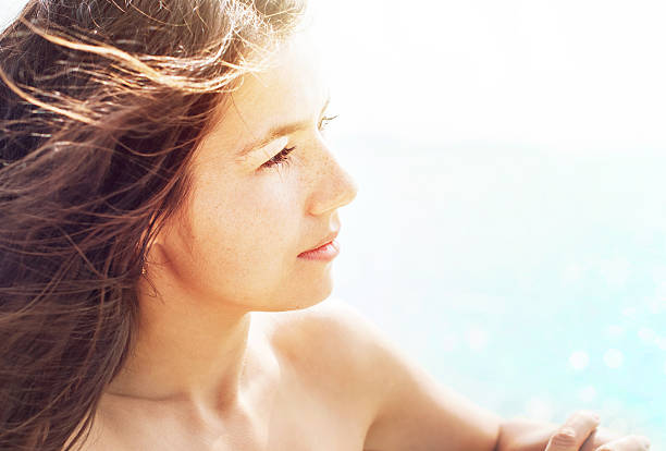 istock Woman Looks on Sea 472982986