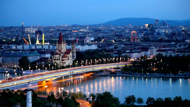 Vienna cityscape at night, filmed from high angle view in full HD with tripod