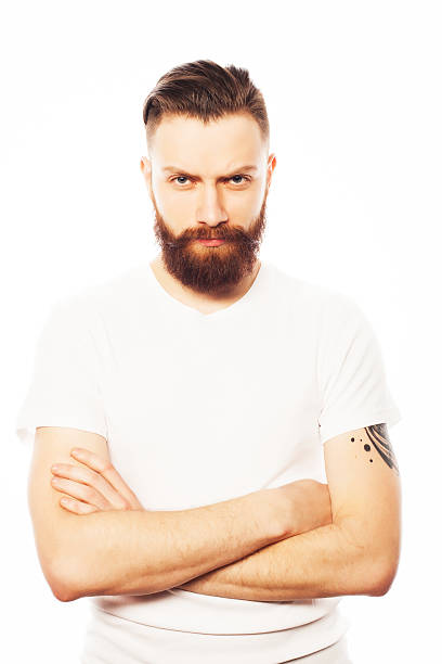 istock Stylish bearded man in white shirt. 472989638